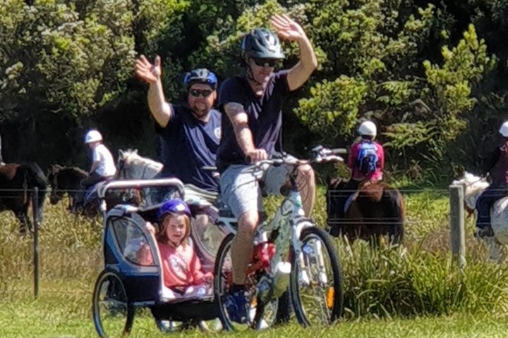Family riding on e bikes